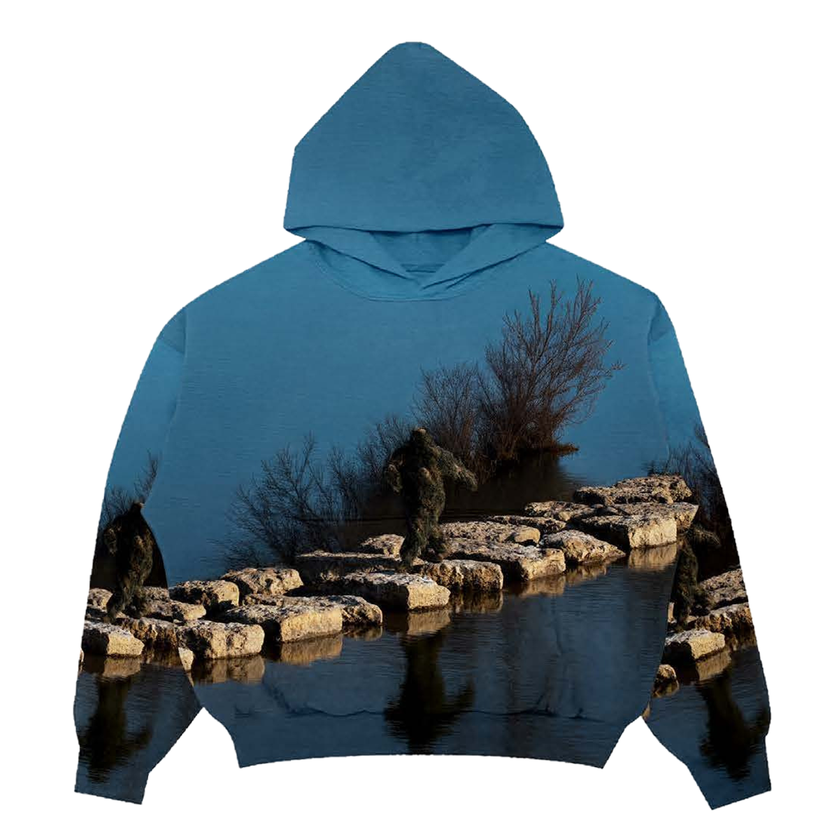 Hoodie with a nature-themed design of a Sasquatch waking on rocks in between a lake on a blue background